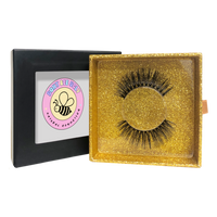Thumbnail for Eyelashes in a gold box with a visible brand logo on a white background