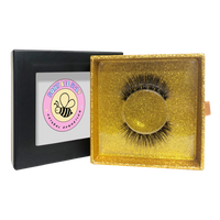 Thumbnail for False eyelashes in a gold box with a brand logo on a white background